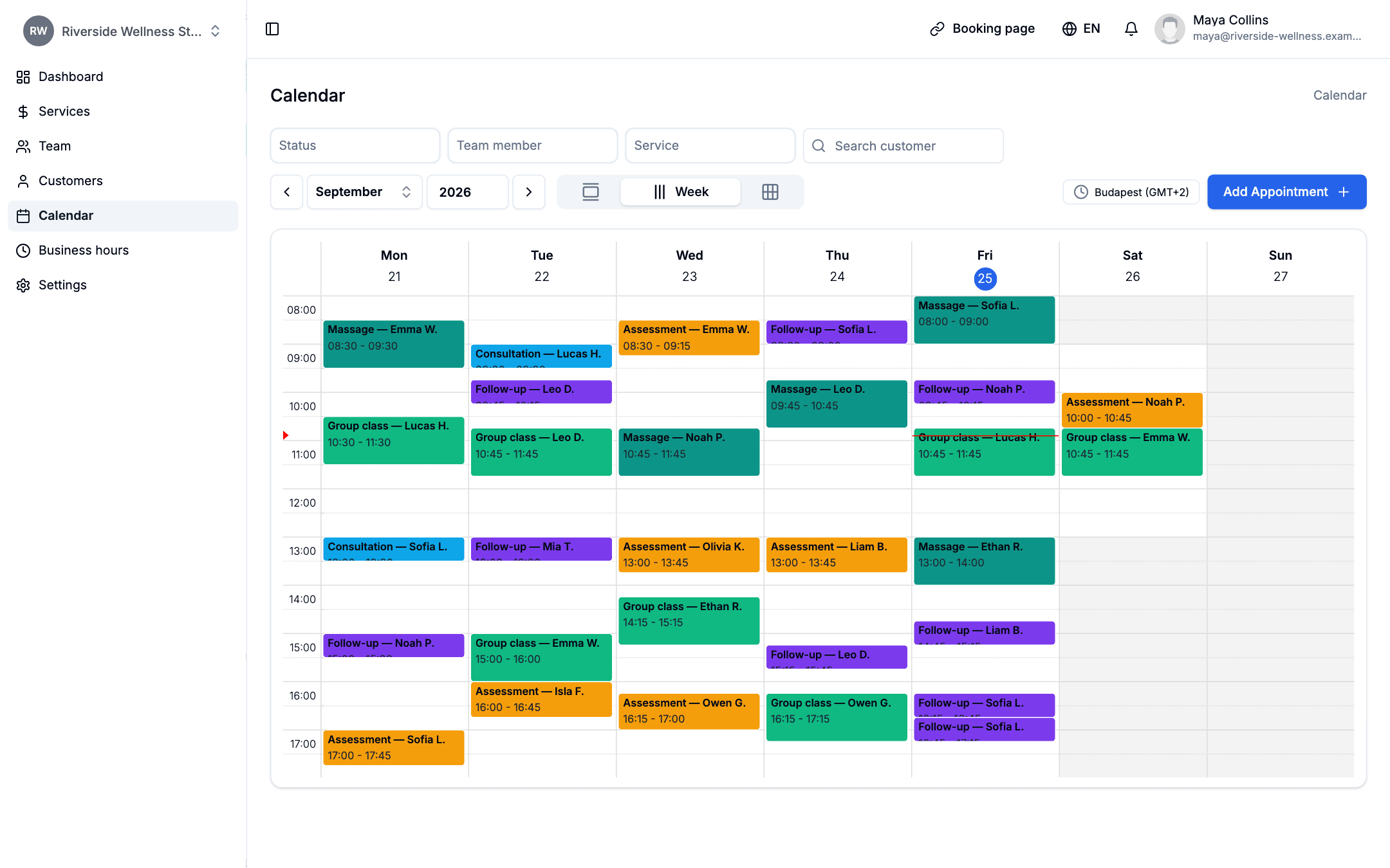 The AppointIQ calendar showing a week of appointments at a wellness studio, colour-coded by service from Monday to Saturday.